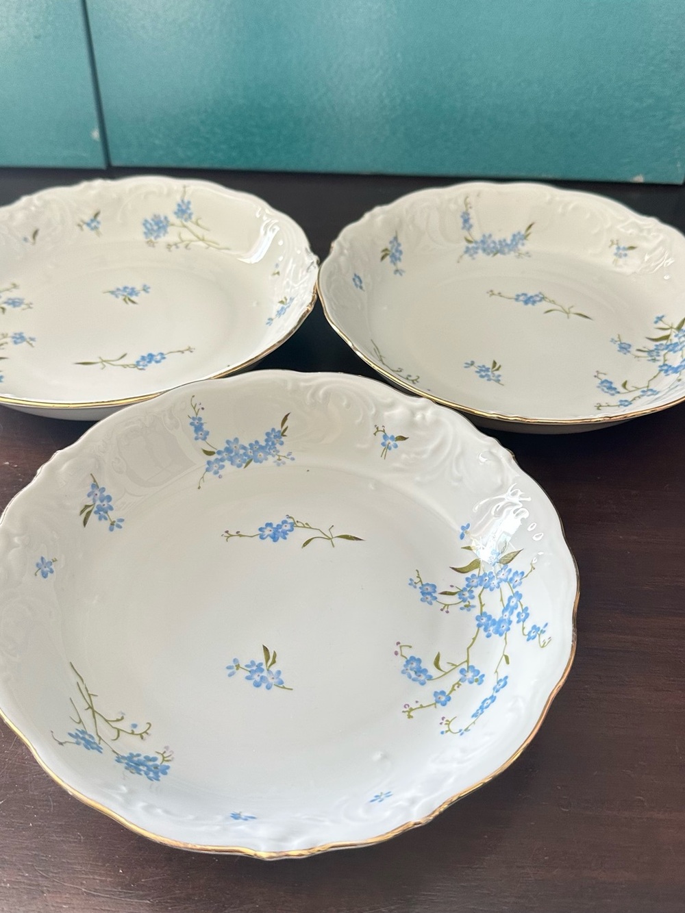 Fine Porcelain Dinner Bowls in White with Blue Floral Motif and Gold Trim